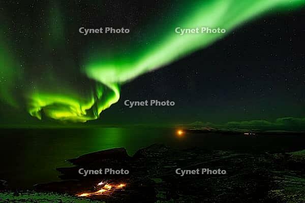 Northern Lights (Aurora borealis) over the Norwegian Sea, S$00F6r$00F6ya, Finnmark, Norway, December 2018 [IBR124563550]