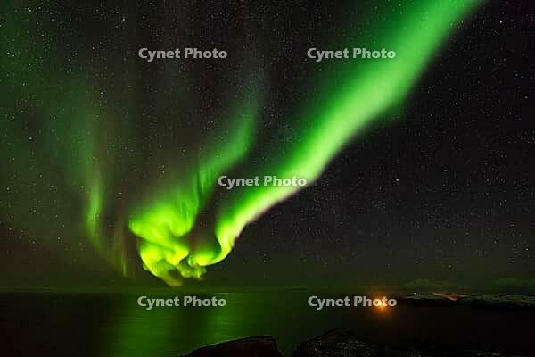Northern Lights (Aurora borealis) over the Norwegian Sea, S$00F6r$00F6ya, Finnmark, Norway, December 2018 [IBR124563553]