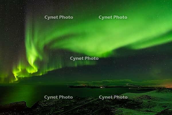 Northern Lights (Aurora borealis) over the Norwegian Sea, S$00F6r$00F6ya, Finnmark, Norway, December 2018 [IBR124563554]