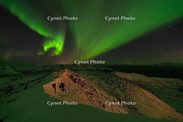 Northern Lights (Aurora borealis), S$00F6r$00F6ya, Finnmark, Norway, December 2018 [IBR124563555]