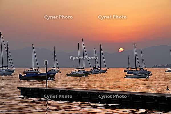 On the Bardolino waterfront, Lake Garda in the evening, Italy - At the promenade of Bardolino, Lake Garda in Italy in the evening [IBR124585239]