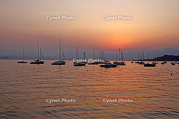 On the Bardolino waterfront, Lake Garda in the evening, Italy - At the promenade of Bardolino, Lake Garda in Italy in the evening [IBR124585274]