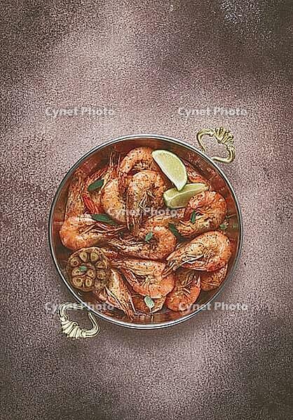 Fried king prawns, in shell, with spices, size 30/40, unpeeled shrimp, homemade, no people [IBR124585347]
