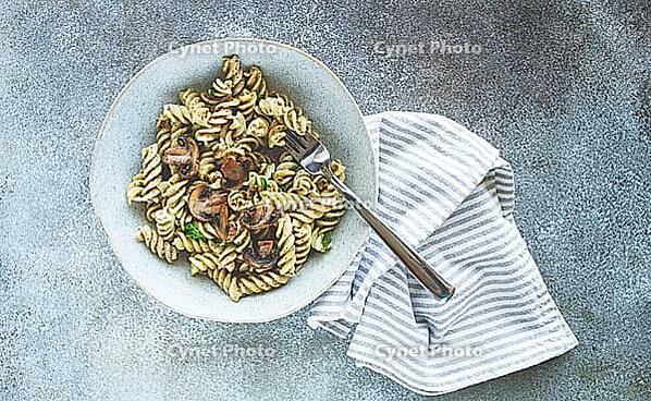 Fusilli pasta, in creamy mushroom sauce, pasta with mushrooms, homemade, no people [IBR124585374]