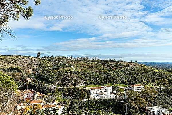 Scenic view of São Marcos da Serra, a traditional village in the Algarve region of southern Portugal, surrounded by rolling hills, nature, and rural landscapes [IBR124586589]