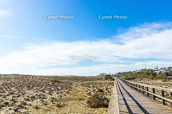 A sandy dune beach in Quinta do Lago, Algarve, Portugal [IBR124586619]