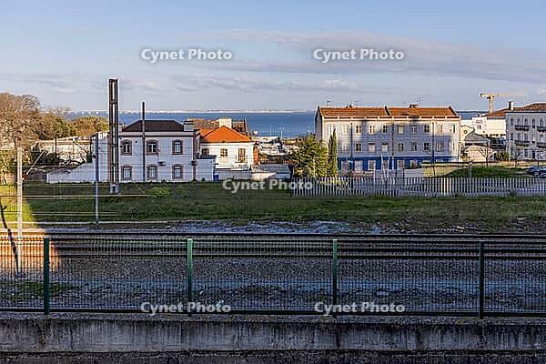 Creative abstract composition featuring a distorted urban scene in Lisbon, Portugal. Glitch-style visual effect blends architectural elements, sky, and ground textures into a surreal, fragmented image with modern artistic appeal [IBR124586622]