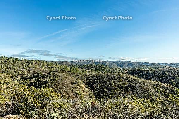 Scenic walking trails winding through the natural landscape of Fonte Férrea in São Brás de Alportel, Algarve, Portugal, offering a peaceful setting for outdoor trips, hiking, and nature exploration [IBR124586638]