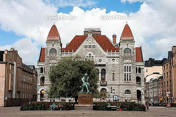 Helsinki, Finland - August 28, 2014 - Historic finnish national theatre with majestic architecture under blue sky [IBR124626851]