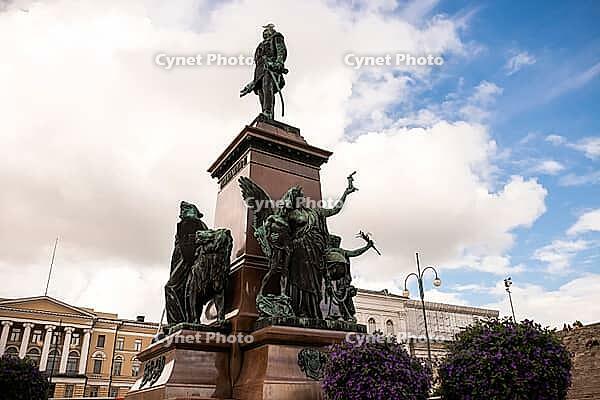 Helsinki, Finland - August 28, 2014 - Bronze alexander ii monument with ornate sculptures in helsinki's senate square [IBR124626854]