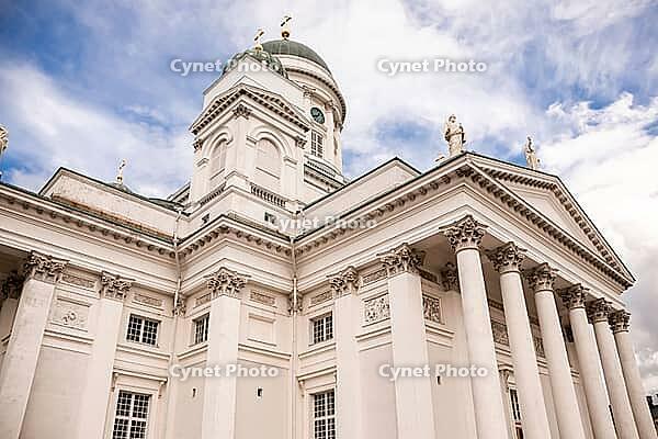 Helsinki, Finland - August 28, 2014 - Majestic exterior of helsinki cathedral against blue sky with clouds [IBR124626901]