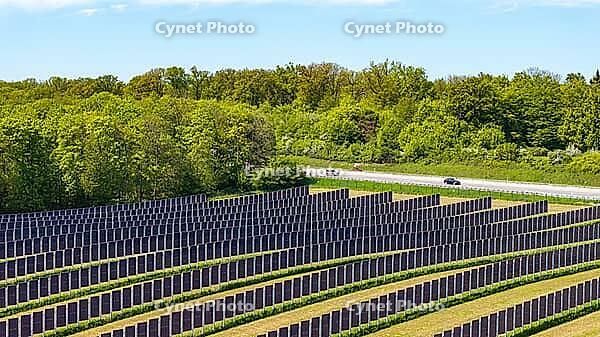 Open-space photovoltaic system, solar park near Bad Rappenau. B$00FCrger.Energie Agri PV system. Vertical solar panels on the motorway. Bad Rappenau, Baden-W$00FCrttemberg, Germany [IBR124629475]