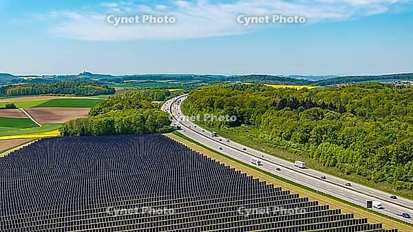 Open-space photovoltaic system, solar park near Bad Rappenau. B$00FCrger.Energie Agri PV system. Vertical solar panels on the motorway. Bad Rappenau, Baden-W$00FCrttemberg, Germany [IBR124629477]