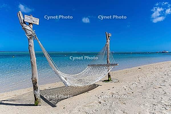 Hammock, cloud, sky, sea, sandy beach, nature, Le Morne, Mauritius [IBR124631277]