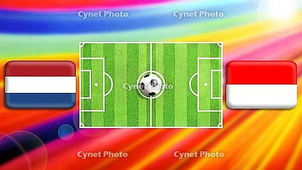 A vivid football showdown featuring a central green pitch with a ball at midfield, flanked by the Netherlands and Indonesia flags. The radiant multicolor background heightens motion, energy, and the spirit of international competition and unity. created u [IBR124641989]
