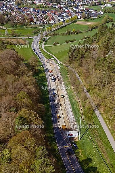 Road construction near an urban area in a green landscape, construction of bicycle path, Aidlingen, Böblingen district, Germany [IBR124642852]