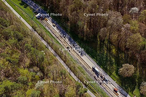 Road construction in the middle of a wooded landscape, construction of bicycle path, Aidlingen, Böblingen district, Germany [IBR124642860]