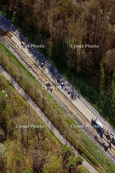 Bird's eye view of road works next to a forest, construction of a bicycle path, Aidlingen, Böblingen district, Germany [IBR124642861]