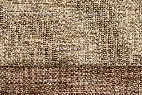 Closeup detail of brown fabric texture background [IBR124676042]