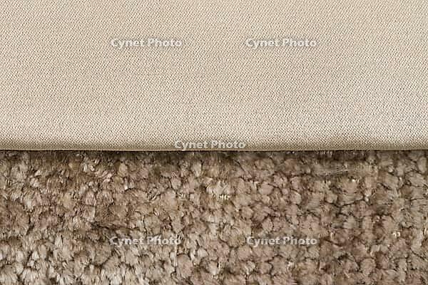 Closeup detail of brown fabric texture background [IBR124676044]