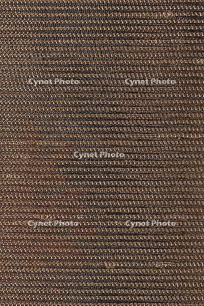 Closeup detail of brown fabric texture background [IBR124676050]
