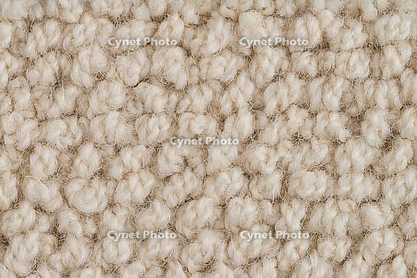 Closeup detail of beige carpet texture background [IBR124676052]
