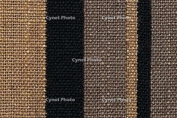 Closeup detail of brown fabric texture background [IBR124676054]