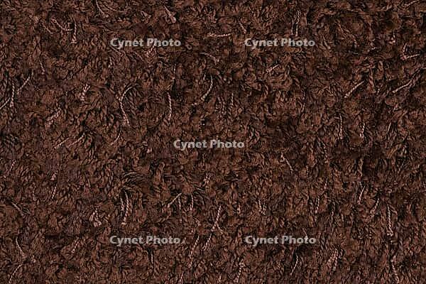 Closeup detail of brown carpet texture background [IBR124676060]
