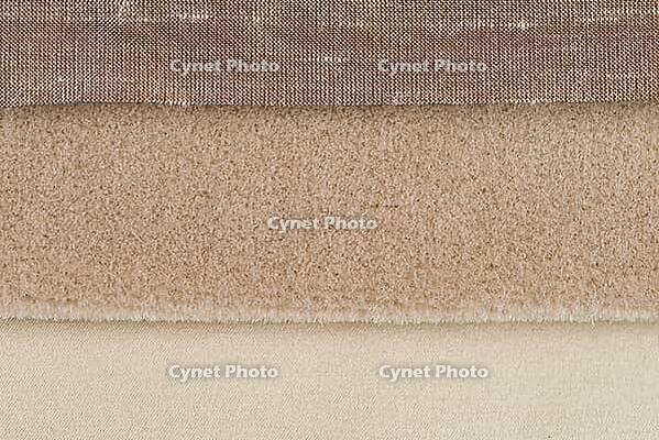 Closeup detail of brown fabric texture background [IBR124676066]