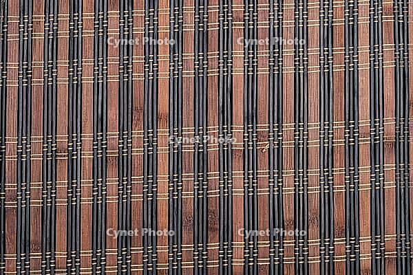 Bamboo placemat straw wood background natural decor [IBR124676087]