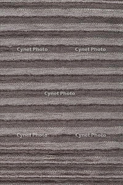Closeup detail of brown fabric texture background [IBR124676097]