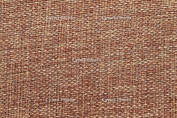 Closeup detail of brown fabric texture background [IBR124676101]