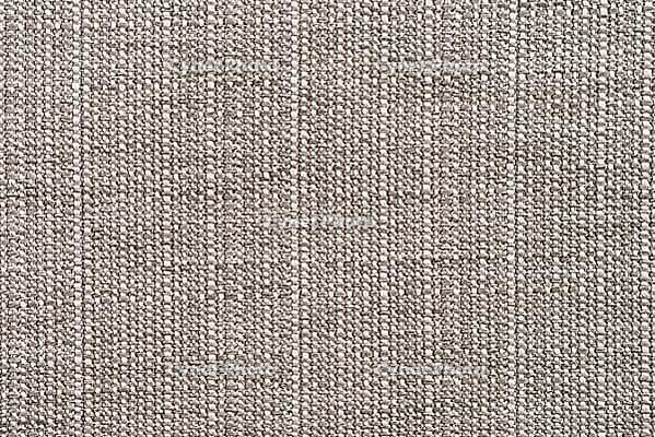 Closeup detail of beige fabric texture background [IBR124676102]
