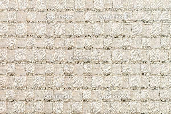 Closeup detail of beige fabric texture background [IBR124676109]