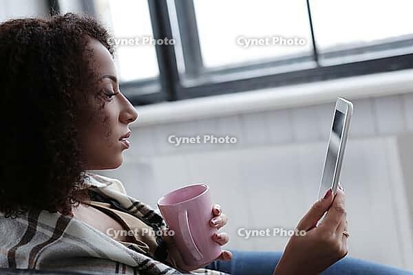 Lifestyle. Beautiful woman at home [IBR124724820]