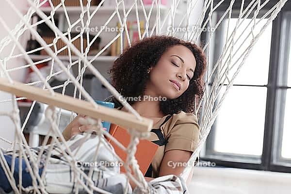 Lifestyle. Beautiful woman at home [IBR124724826]