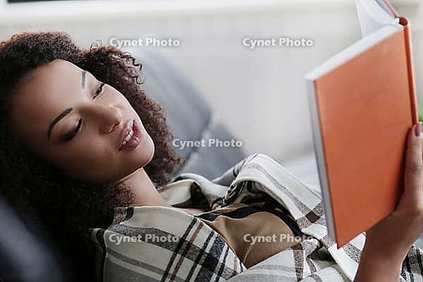 Lifestyle. Beautiful woman at home [IBR124724833]