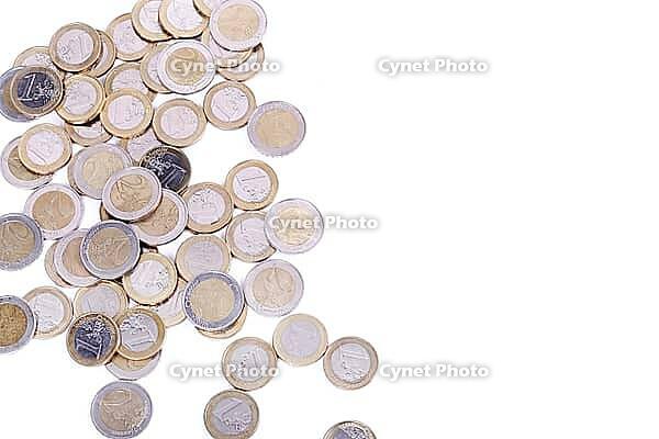 Heap of coins on a white background [IBR124724853]