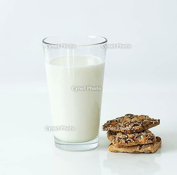 Glass of milk on the table [IBR124724857]