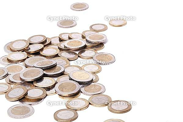 Heap of coins on a white background [IBR124724874]