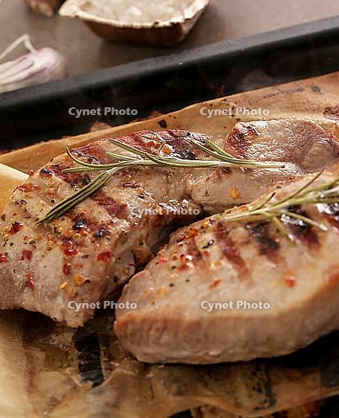 Cooking. Grilled meat on the table [IBR124724900]
