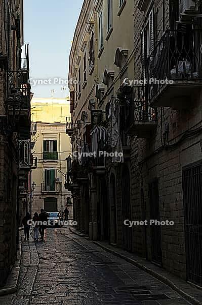Narrow street in Trani, Puglia, Italy [IBR124748857]