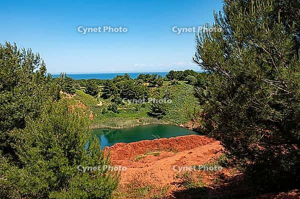 Bauxite lake near Otranto in Puglia, Italy [IBR124748896]