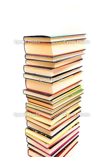Stack of books against a white background [IBR124748901]