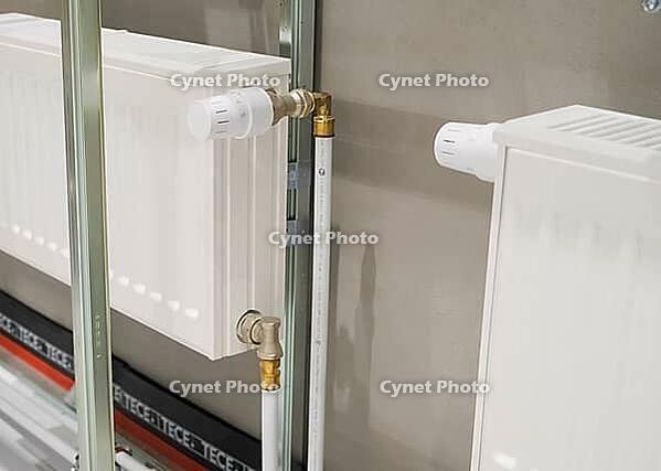 Heating radiators in a private house. installation of new radiators [IBR124748902]
