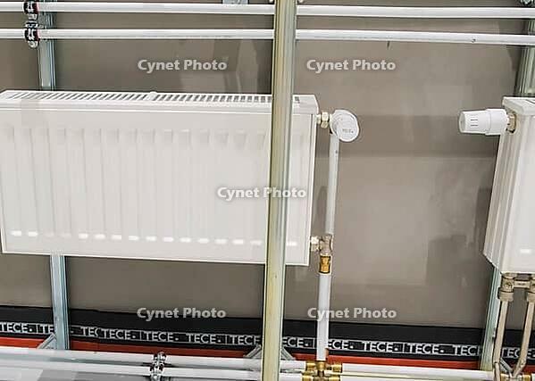 Heating radiators in a private house. installation of new radiators [IBR124748909]