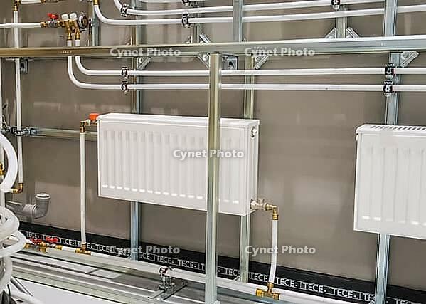 Heating radiators in a private house. installation of new radiators [IBR124748914]