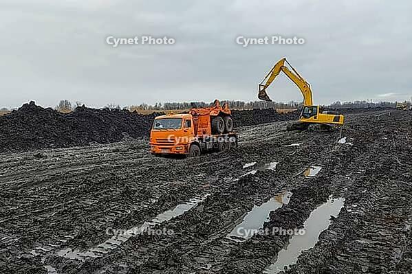 Trucks stuck in the mud involved in the construction of the gas pipeline [IBR124748922]