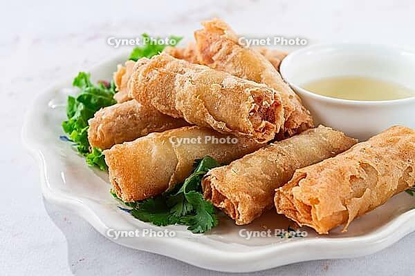 Pork nams, Vietnamese pancakes, rice paper stuffed, sunshine, with gnocchi sauce, no people [IBR124748968]