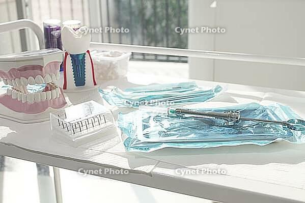 Sterile medical instruments, lying on a tray in protective packaging, dentist's instruments, preparation for a medical procedure [IBR124748991]
